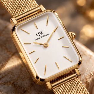 Guldfärgad Daniel Wellington damklocka med vit urtavla och meshlänk i 20mm