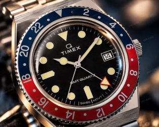 Timex herrklocka i stål med schweiziskt urverk och GMT-funktion i 38mm