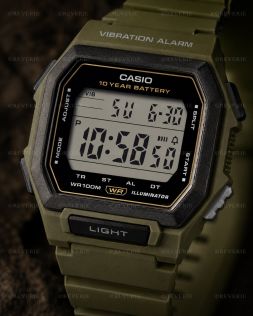 Grön Casio digitalklocka med fyrkantig design och vibrationslarm i 42mm