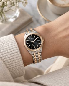 Tvåfärgad Citizen damklocka med svart urtavla, solenergi och safirglas i 33mm