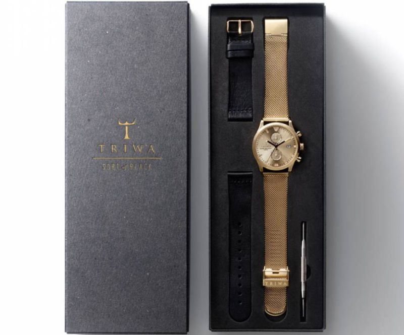 Triwa Sort of Black Gold Chrono Guldfärgad klocka med två olika