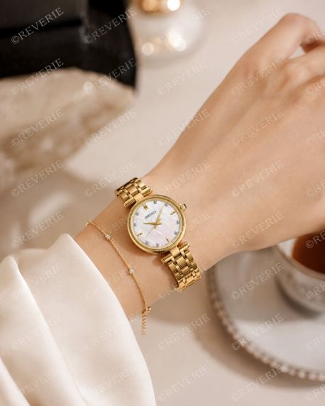 Seiko guldfärgad damklocka med 8 diamanter, safirglas och pärlemorurtavla 29mm