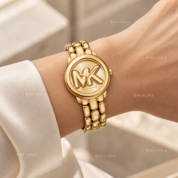 Guldfärgad Michael Kors damklocka med stor MK-logotyp och kraftig stållänk i 36mm